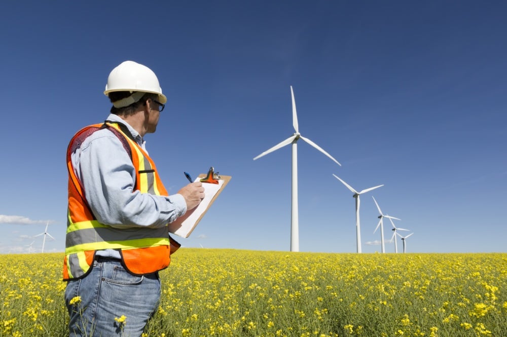 Inspector at work at wind turbines