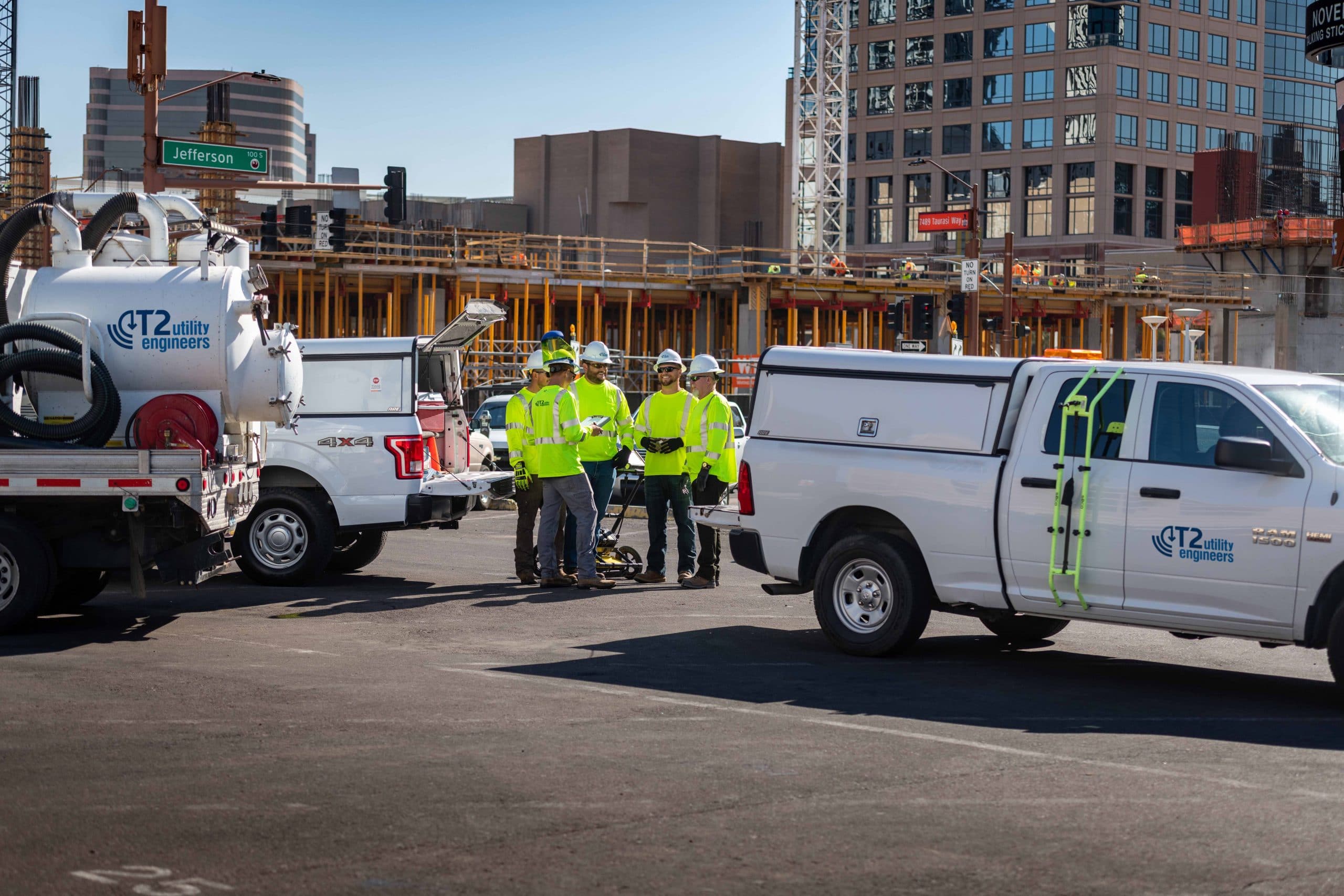 A group of T2UE Engineers having a meeting at a client site